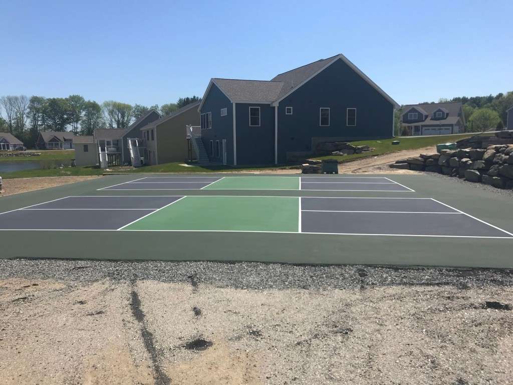 Tennis courts and houses in a residential neighborhood